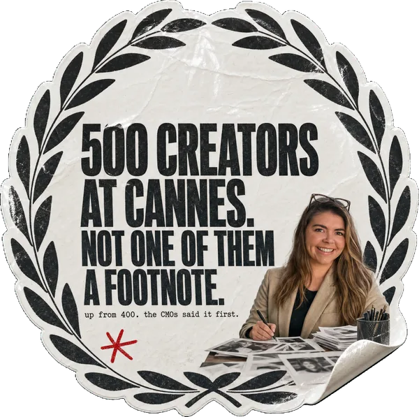 A film-festival laurel wreath sticker reading 500 CREATORS AT CANNES. NOT ONE OF THEM A FOOTNOTE., with Rosie Arrowsmith as a casting director behind a stack of headshots.