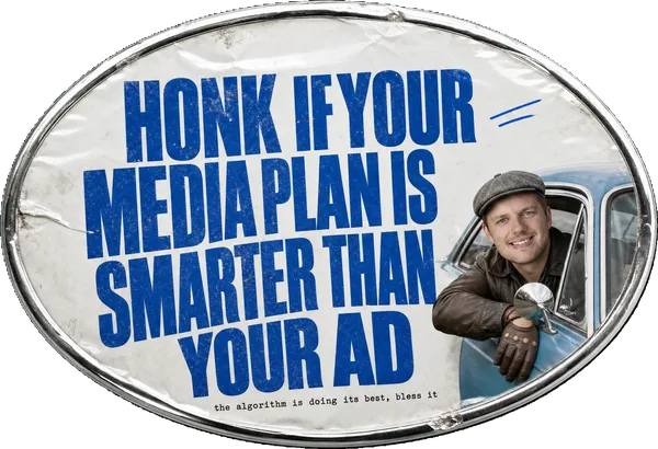 A chrome bumper-sticker oval reading HONK IF YOUR MEDIA PLAN IS SMARTER THAN YOUR AD, with Alex Morris leaning from a car window.